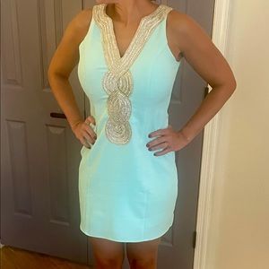 Cute mint green dress with gold and silver accent
